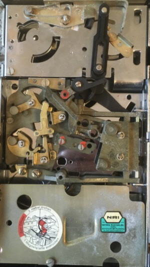 Beispiel mechanischer Prüfer mit 4 Münzen DEM Beispiel mechanischer Prüfer mit 4 Münzen DEM